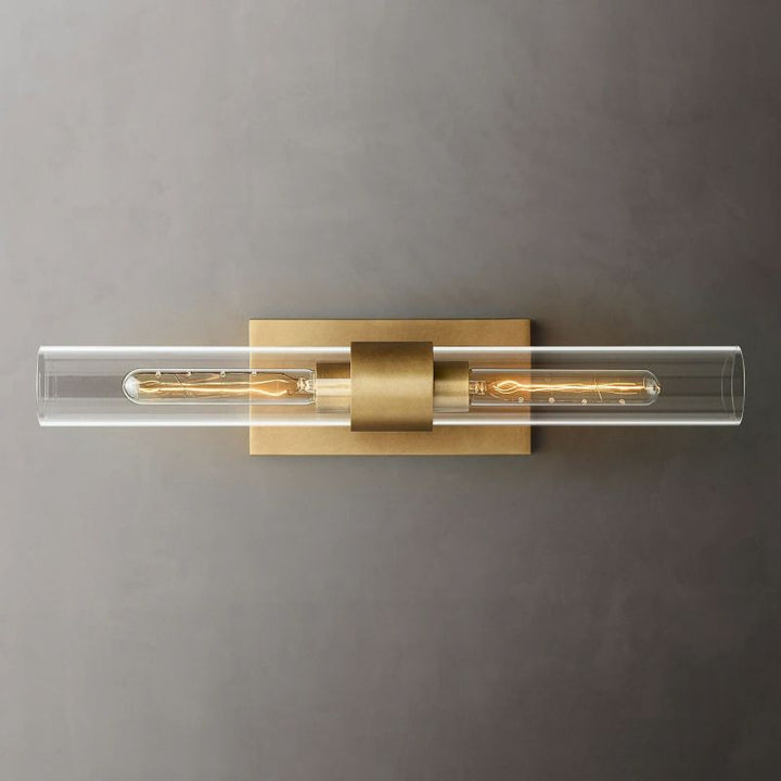 Decorative 23-inch modern brass & clear glass wall sconce, ideal interior lighting for home.