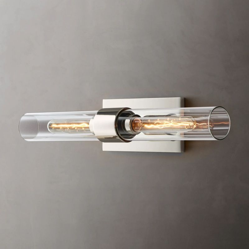Sleek brass & clear glass 2-light wall sconce, a modern decorative interior lighting fixture.