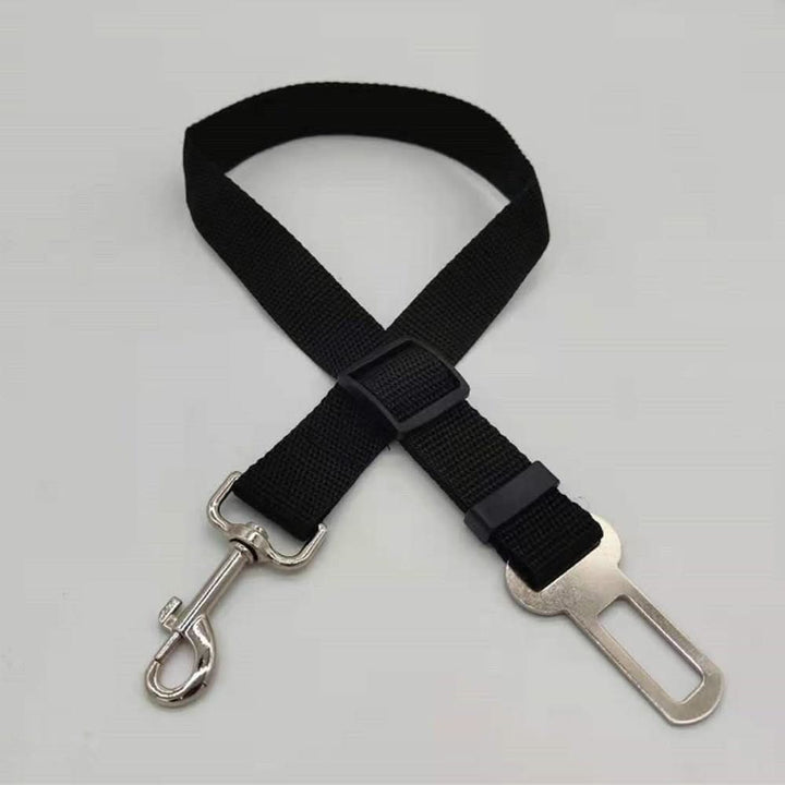 Durable dog safety belt, easy to attach to any car seatbelt. Essential pet accessory for safe vehicle travel.