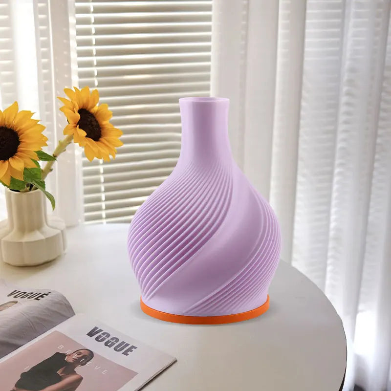 Bright LED vase table lamp offering adjustable lighting, ideal for modern home decor and ambient glow.