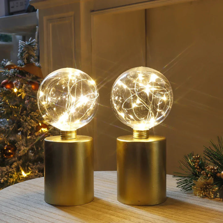 Elegant gold cordless table lamps (2-pack) providing warm LED light, perfect for bedroom or living room decor.
