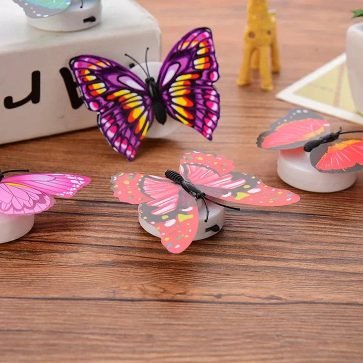 Whimsical LED butterfly nightlight, a battery-powered stick-on wall lamp offering soothing, color-changing light.