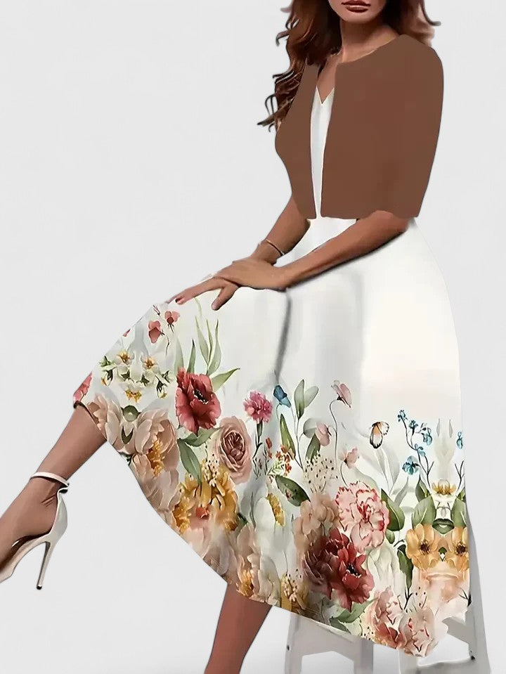 Elegant women's midi dress with beautiful floral print and chic colorblock design. Flattering A-line for parties.