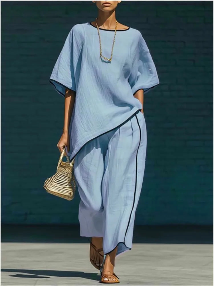 Women's comfortable two-piece cropped wide-leg pant & matching top set, perfect for stylish casual wear.