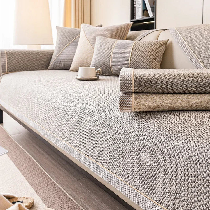 All-season quilted cotton-linen sofa cover provides non-slip protection for your furniture. Durable & comfortable couch protector.