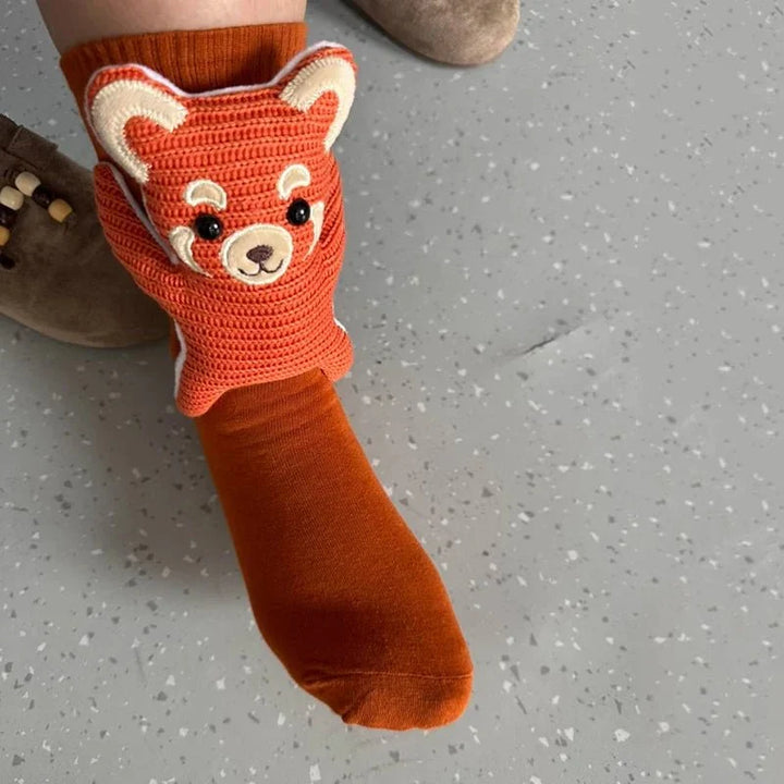 Plush unisex animal socks with non-slip sole, ensuring warmth and safety on hard floors. Great gift idea.