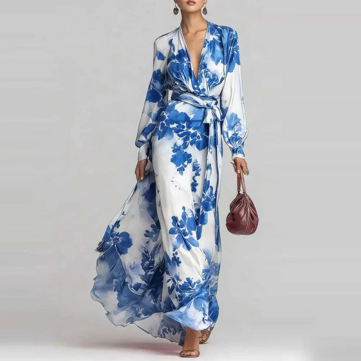 Blue bohemian maxi dress, womens fashion. Features deep V-neck, lantern sleeves, and a flattering belted design.