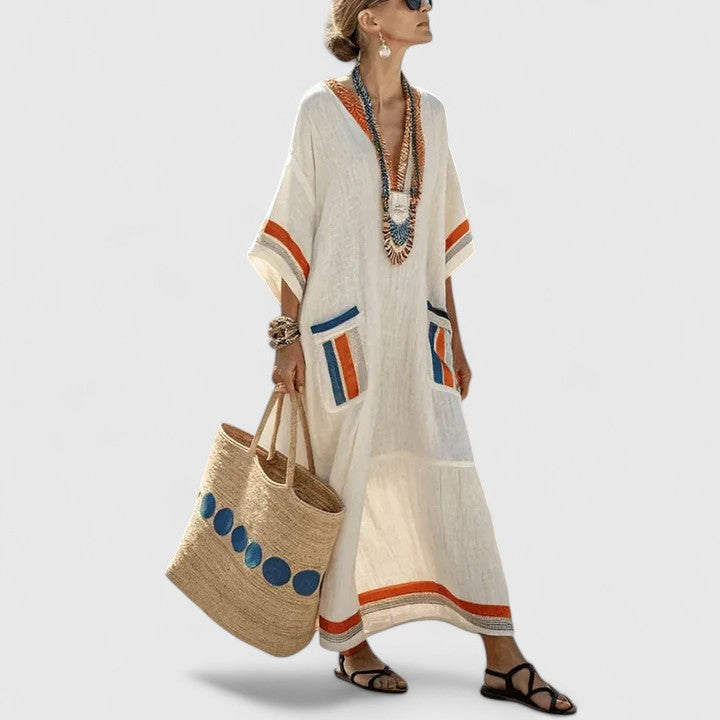 Stylish women's bohemian maxi dress, flowy and comfortable. Long summer dress with pockets, perfect for vacation beachwear.