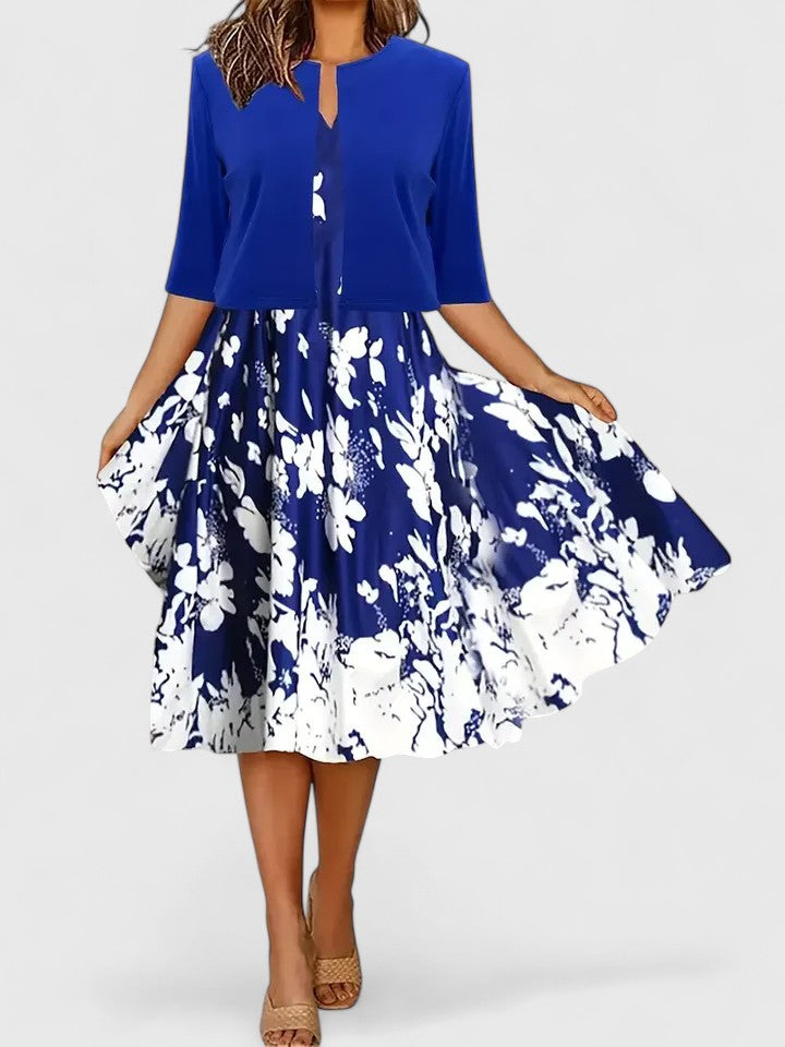 Chic women's A-line midi dress with elegant floral print & stylish colorblock. Flattering & comfortable for any event.