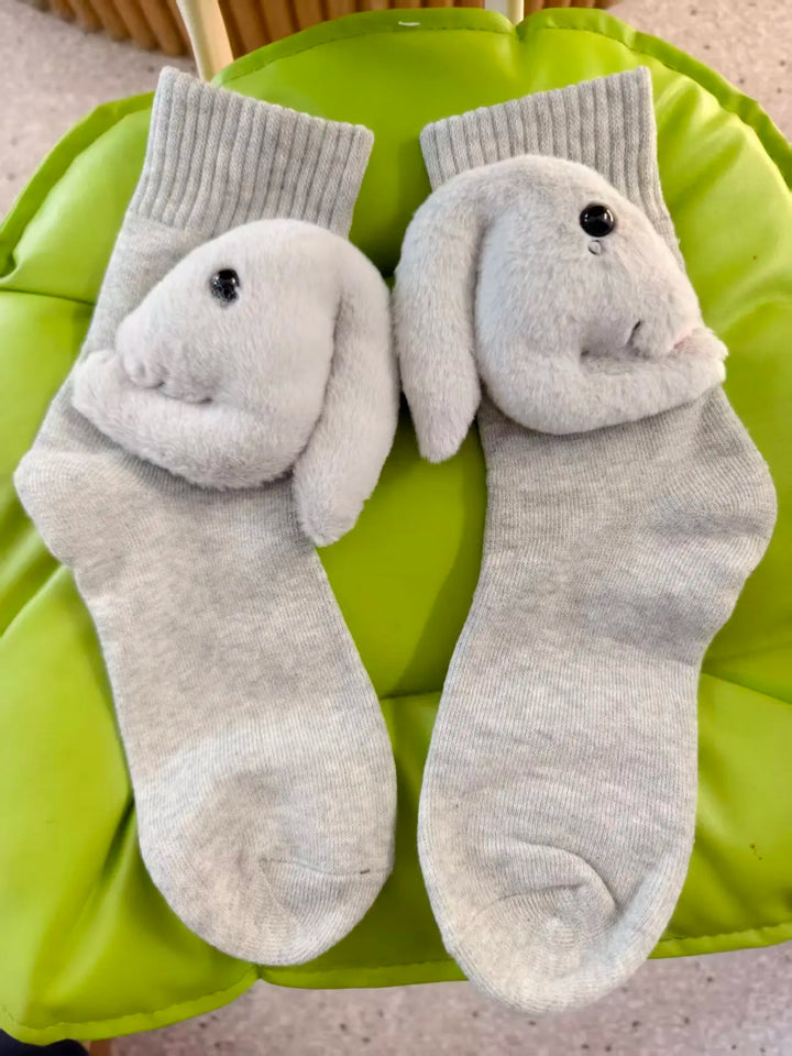 Warm and comfortable animal house socks with a non-slip sole, ideal for lounging and home comfort.