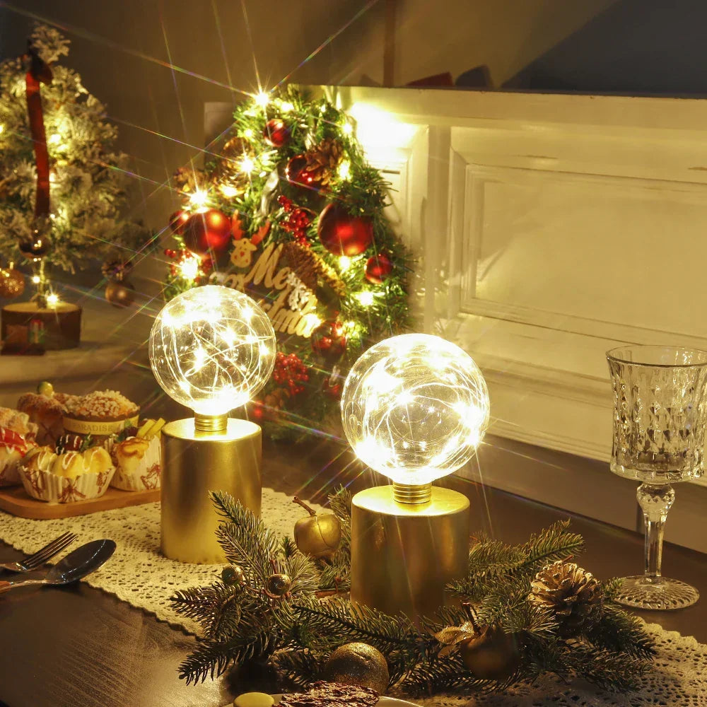 Decorative gold table lamp set (2 pack) with cordless LED light. Ideal accent for shelves, nightstands, or consoles.