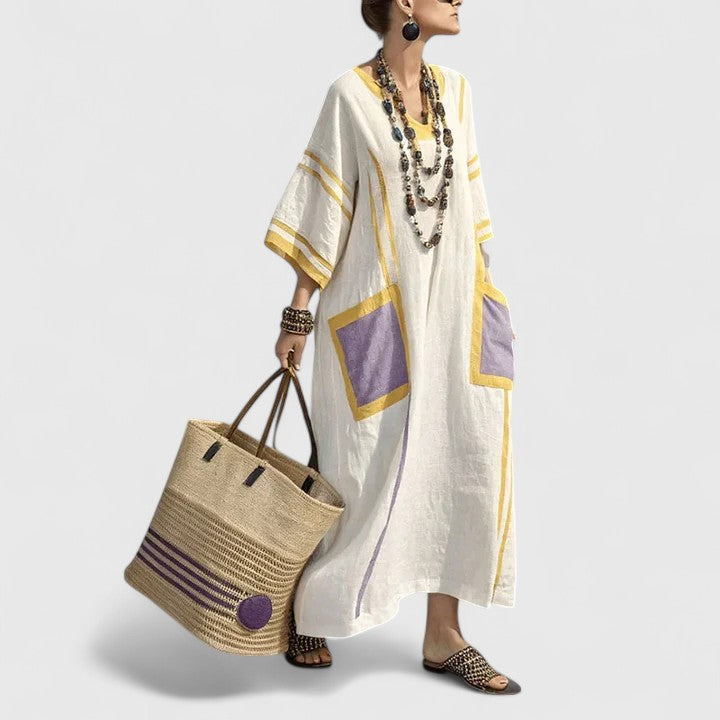 Women's long bohemian maxi dress with pockets. Perfect elegant summer dress for warm weather, versatile & comfortable.