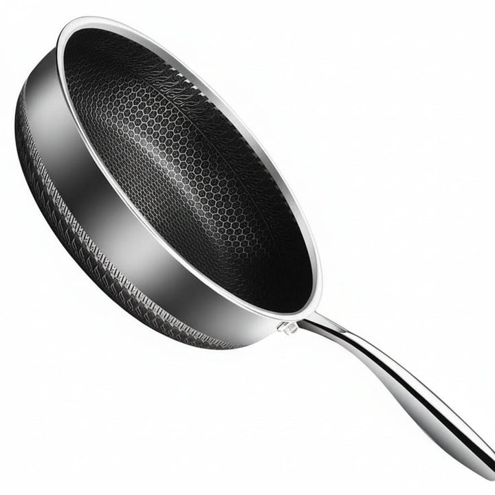 Uncoated stainless steel frying pan for professional cooking. Durable, induction ready kitchen cookware.