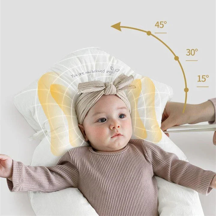 Gentle support baby pillow: Organic cotton U-shape head support for infant sleep in stroller.