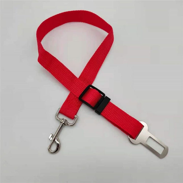 Pet safety car seatbelt, adjustable for all dog sizes. Ensures secure and comfortable travel restraint on road trips.