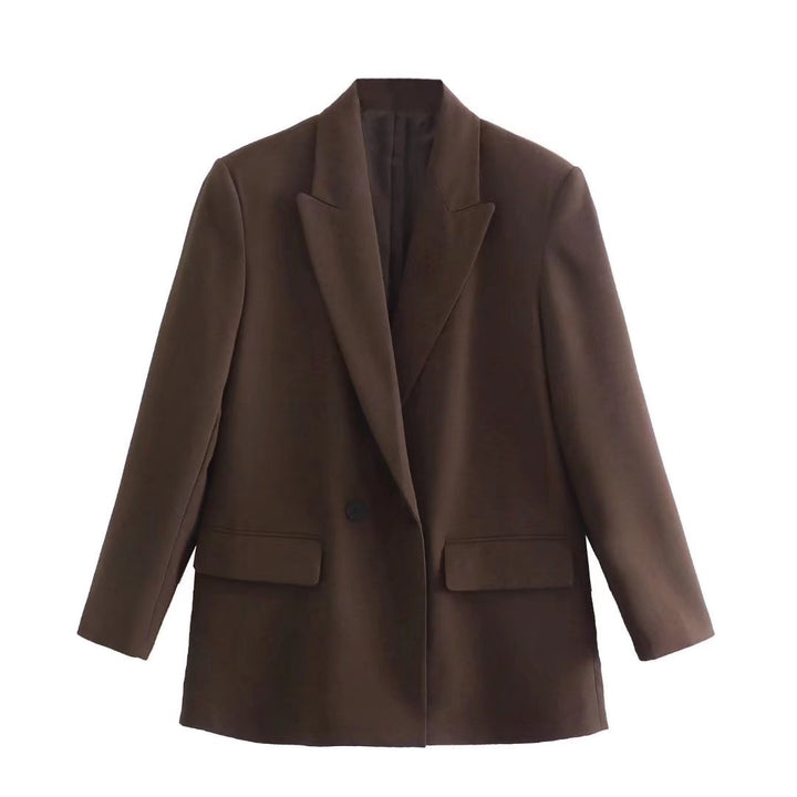 Fashionable women's double-breasted jacket, perfect for a smart office wear aesthetic.