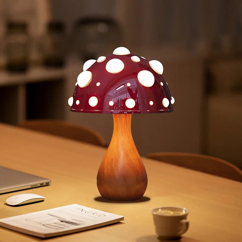 Tavvitaimp18 mushroom desk lamp casting a warm glow, great for reading or relaxing. USB powered.