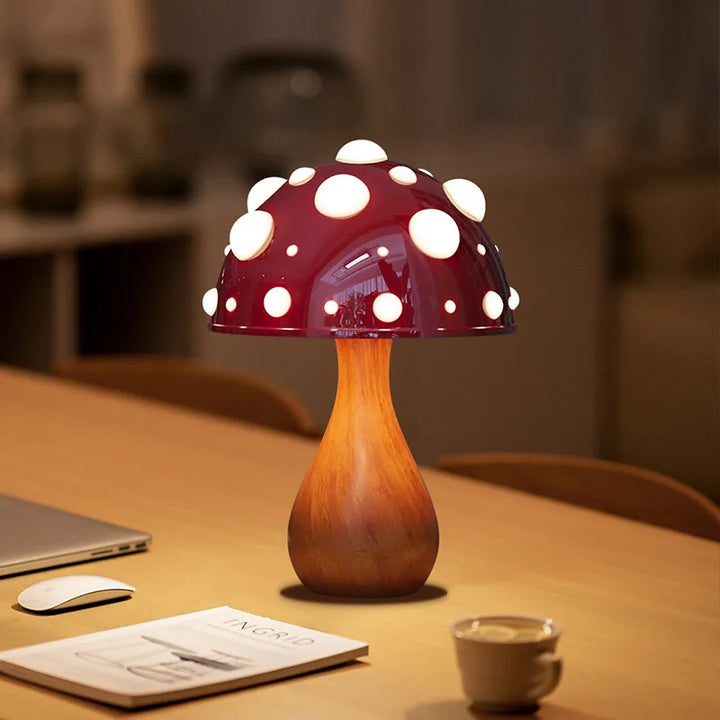 Tavvitaimp18 mushroom desk lamp casting a warm glow, great for reading or relaxing. USB powered.