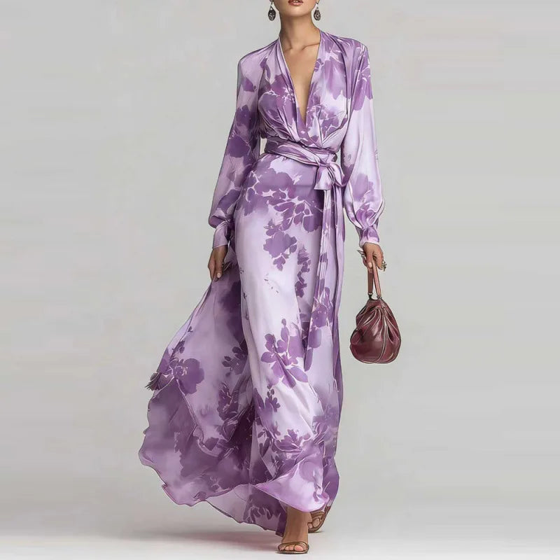 Purple flowy bohemian maxi dress for women. Stylish V-neck, elegant lantern sleeves, perfect for summer fashion.
