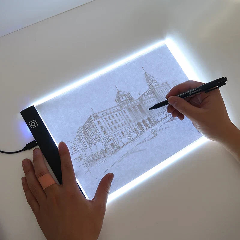 Unisex illuminated art tracing pad with adjustable brightness, ideal for drawing, sketching, and design.