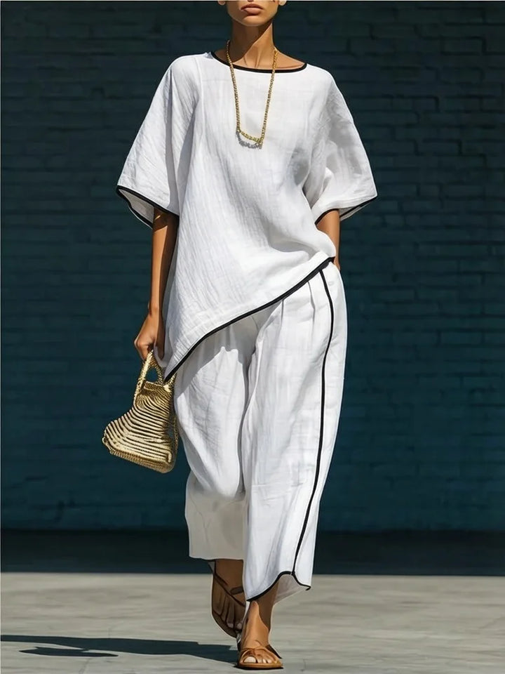 Women's chic cropped pant & top set, featuring a comfortable relaxed fit and wide-leg trousers for effortless style.