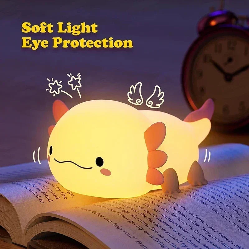 Portable rechargeable silicone night light for kids, featuring soft LED light & easy touch control for bedtime.