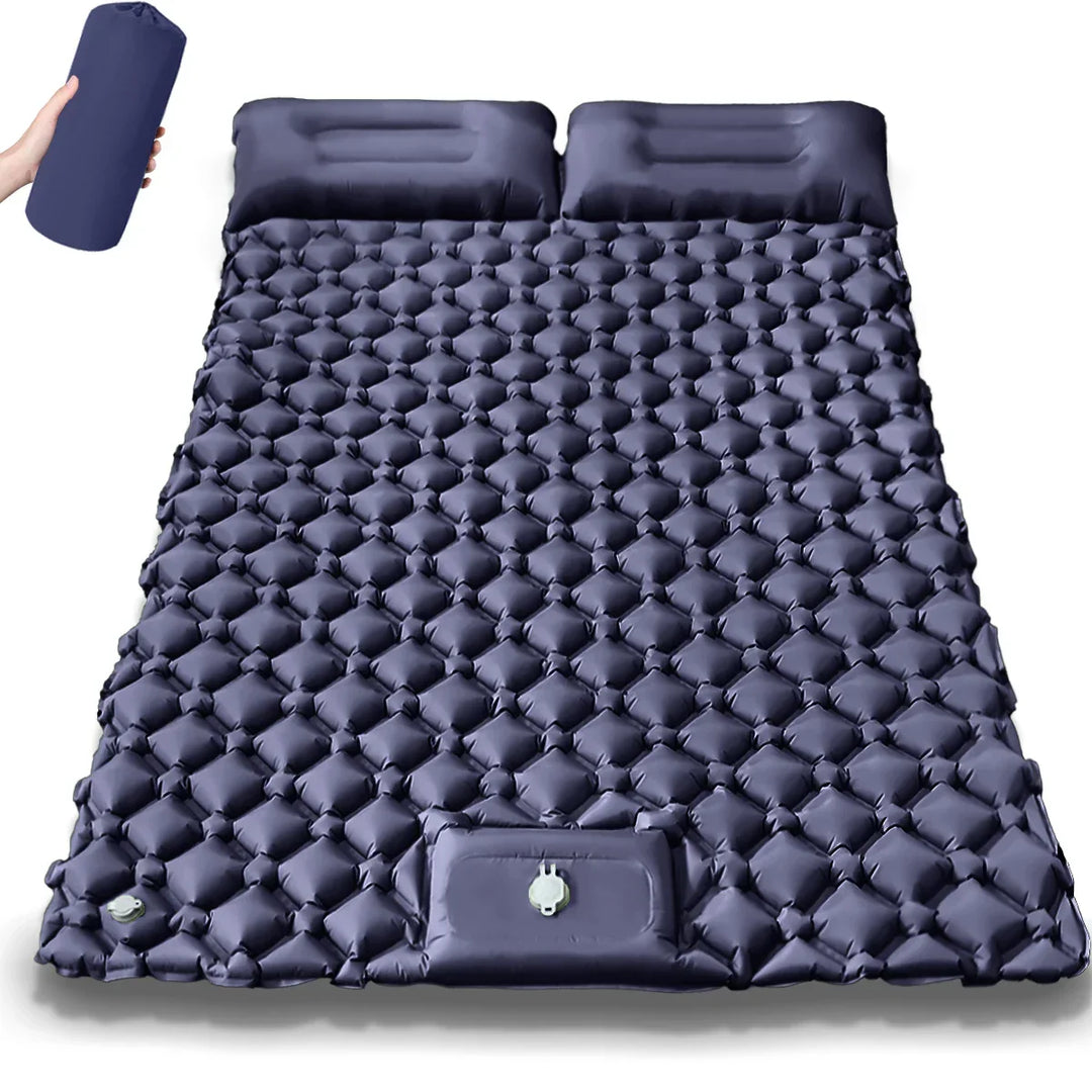 Dual camping air bed under starry sky. Cozy inflatable mattress for comfortable stargazing and outdoor sleep.