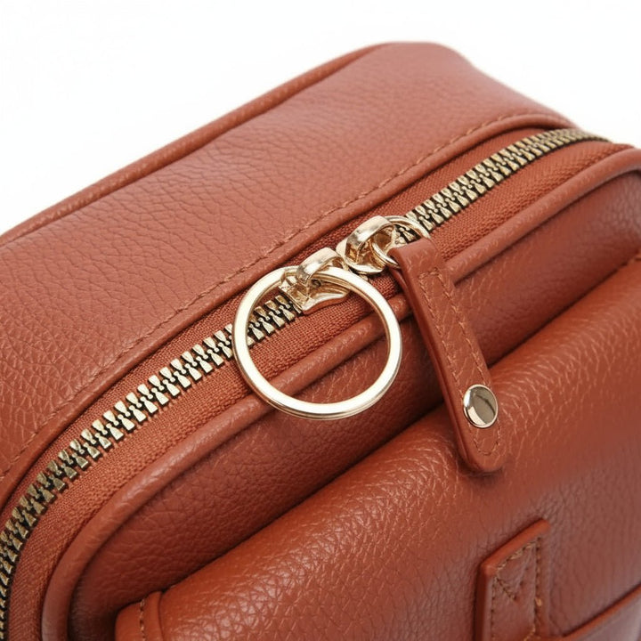 Secure black anti-theft travel bag. Compact unisex crossbody with hidden zippers & RFID protection for valuables.