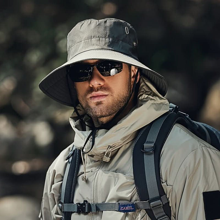 Adjustable wide brim sun hat for hiking, fishing & camping. Offers excellent UV protection & breathable comfort.