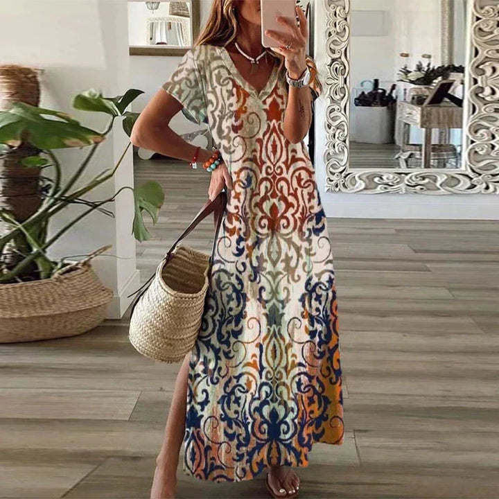 Women's bohemian maxi dress with short sleeves, v-neck, and flowy silhouette. Perfect for summer casual wear or vacation.