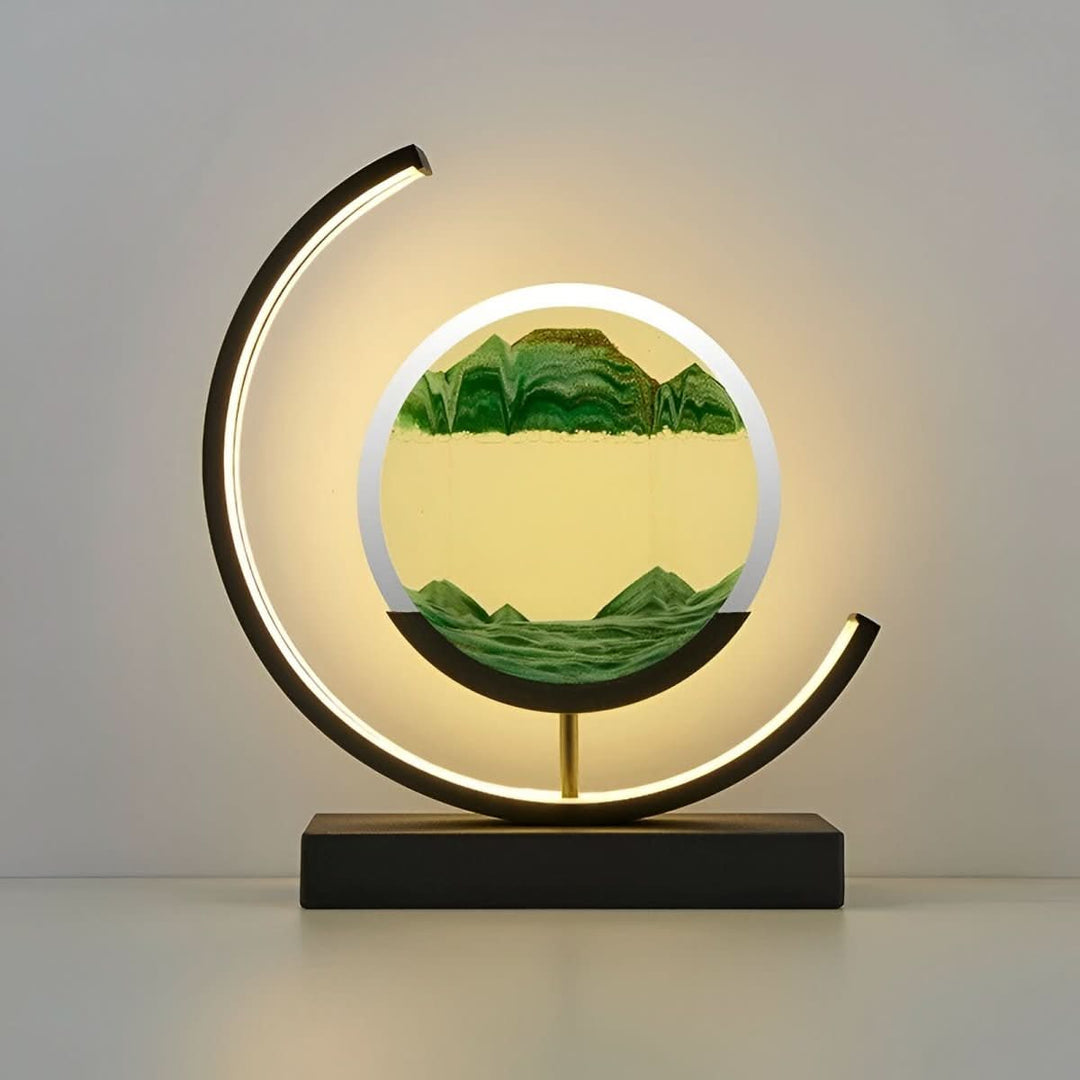 Dynamic sand art and LED table lamp combo. Modern mood light for home decor, providing ambient relaxation.