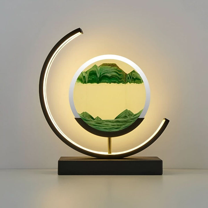 Dynamic sand art and LED table lamp combo. Modern mood light for home decor, providing ambient relaxation.