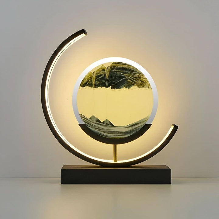 Mesmerizing dynamic sand art LED night light. Modern table lamp offers calming ambient lighting for any room.
