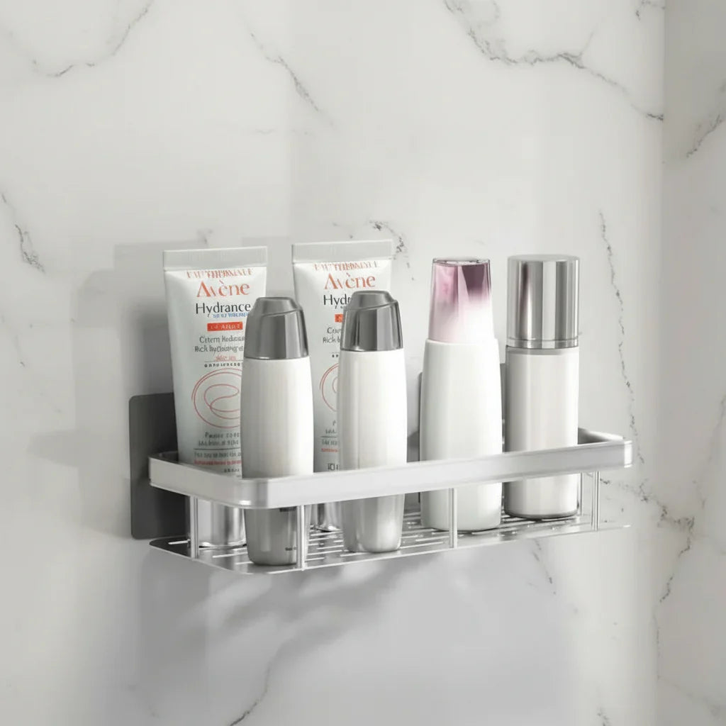 Organize your bathroom with this drill-free adhesive wall shelf. Space-saving shower storage.