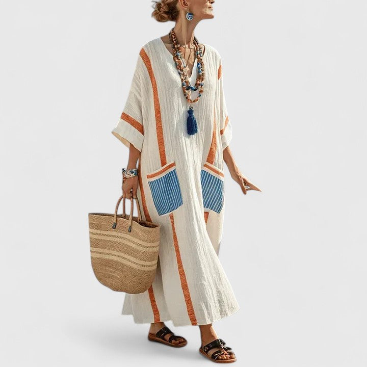Versatile women's bohemian maxi dress featuring practical pockets. Ideal casual long dress for summer & vacation.