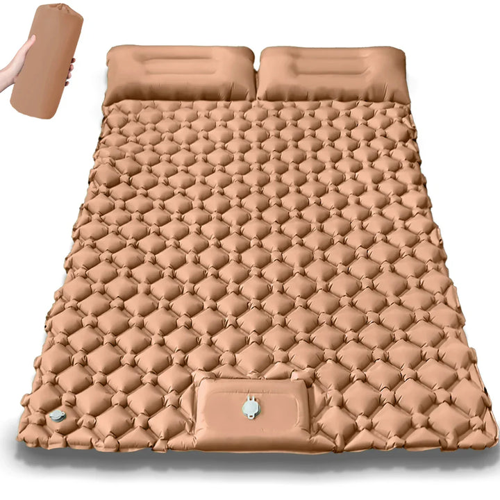 Water beading on a waterproof dual camping air bed. Durable inflatable mattress for challenging outdoor conditions.