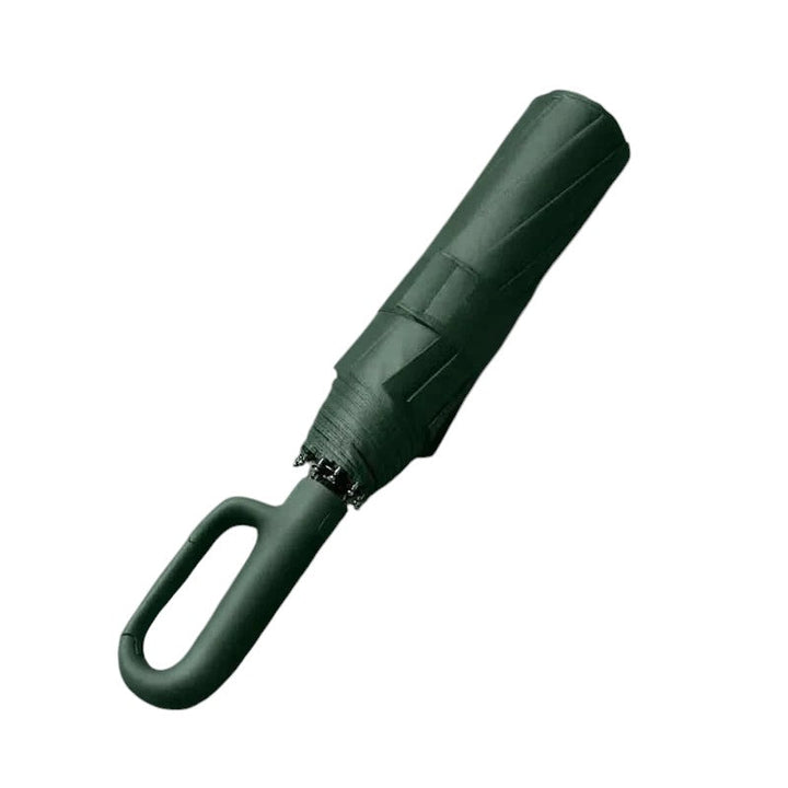 Portable automatic travel umbrella fitting in a bag, essential travel accessory for sun and rain protection.