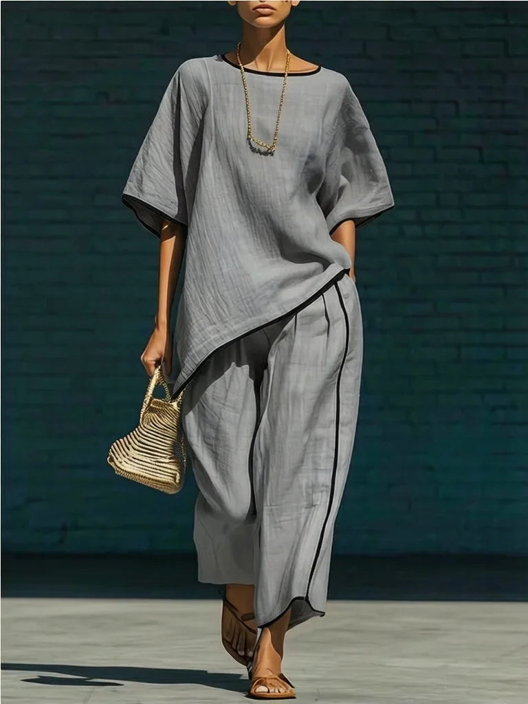 Casual yet elegant women's cropped pant & top two-piece set, perfect for versatile summer outfits and comfort.