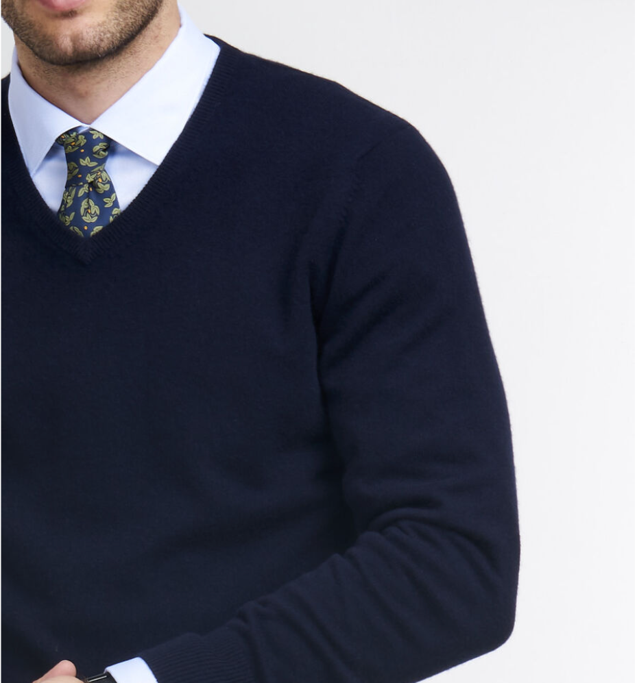 Classic men's navy blue round neck cashmere sweater, offering soft comfort & a versatile luxury knit.