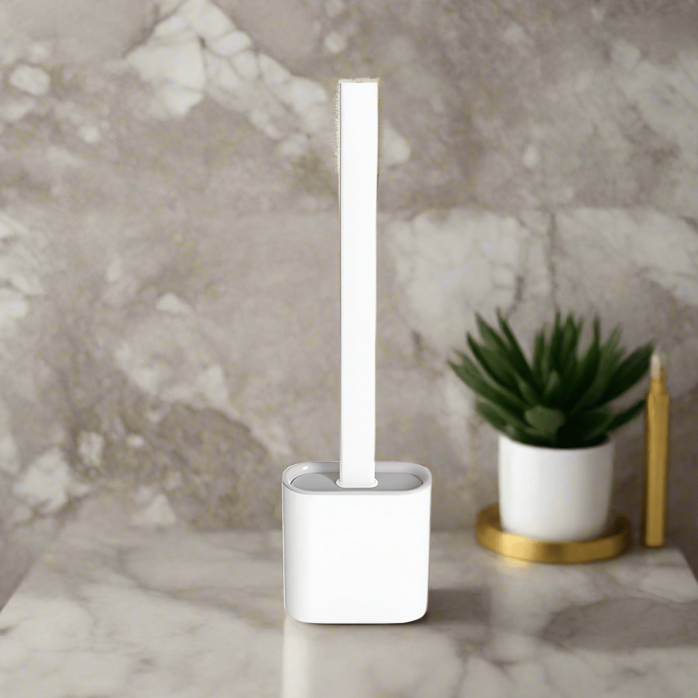 Ergonomic flexible silicone toilet brush reaching under rim for deep, hygienic bathroom cleaning. Space-saving design.