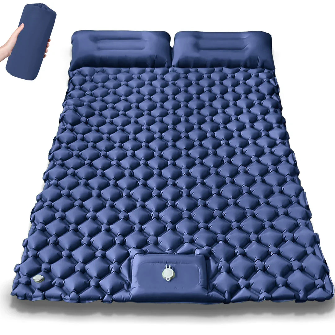 Unpacked Tavvitaimp18 dual camping air bed. Unisex inflatable mattress with integrated pump, ready for adventure.