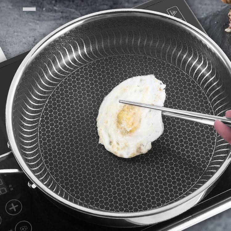 Robust stainless steel cookware with even heat technology, a durable frying pan for daily use.