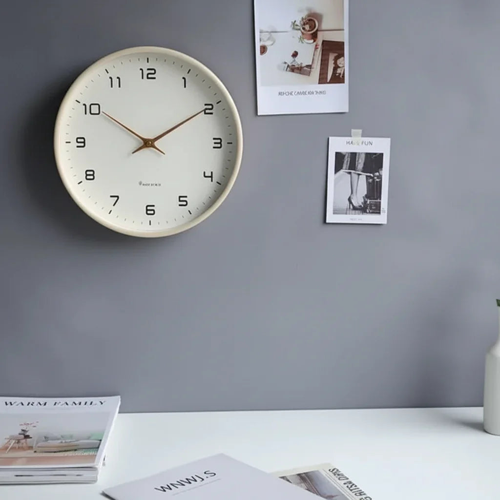 Minimalist Scandinavian wooden wall clock in beige, perfect for modern home decor. Silent quartz movement.