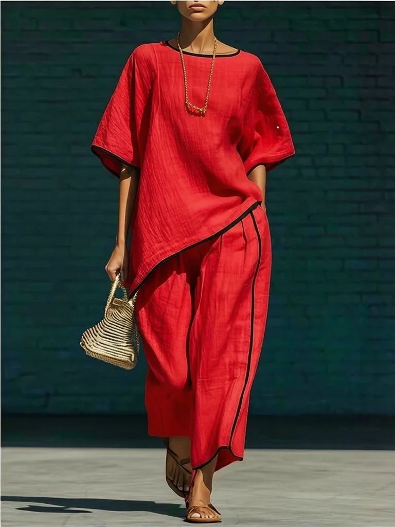 Stylish women's wide-leg cropped pants and matching top set, a versatile two-piece casual outfit.