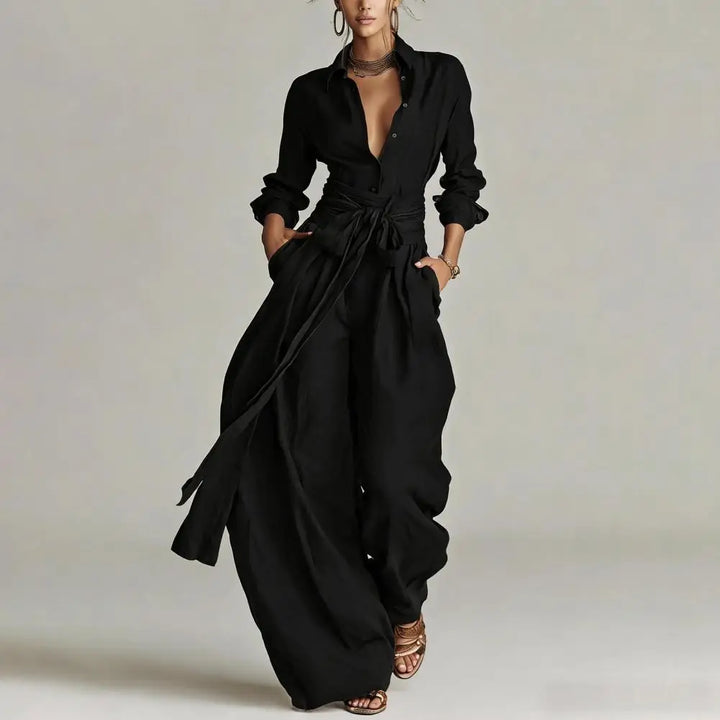 Stylish black women's co-ord set. Fashionable button-down top & relaxed wide-leg trousers for an elegant look.