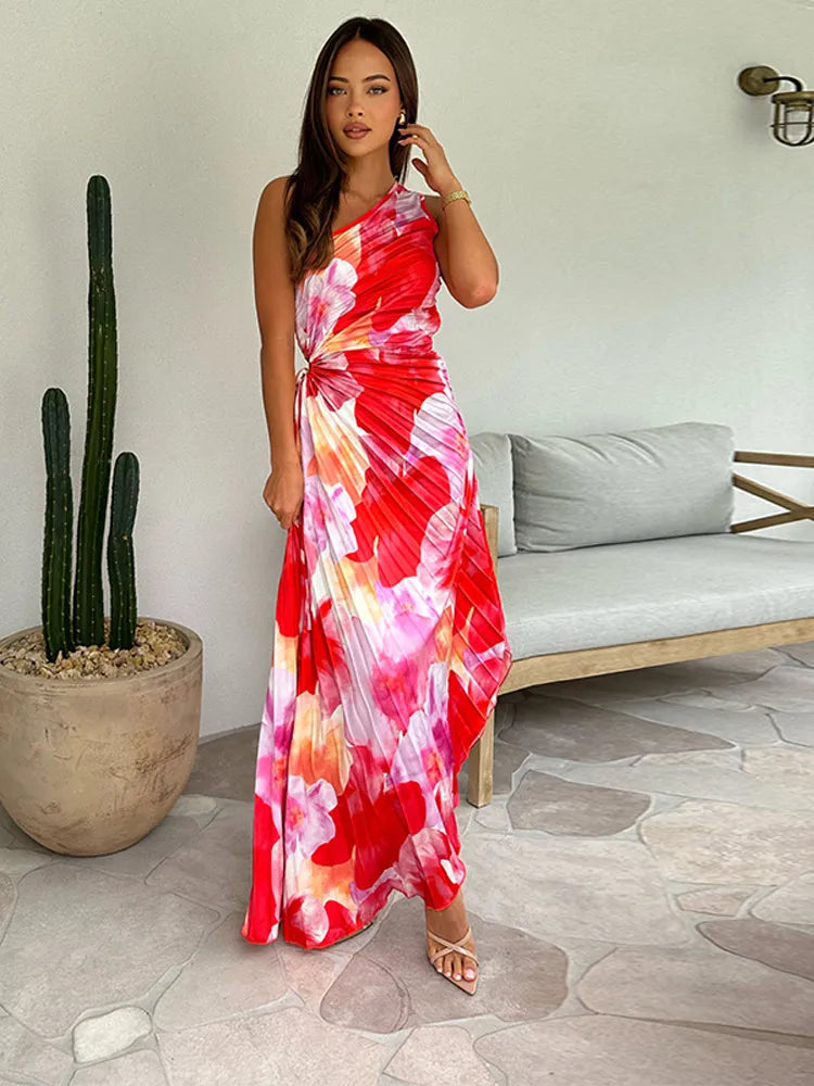 Wedding guest maxi dress featuring a delicate floral print and elegant pleated skirt for women.