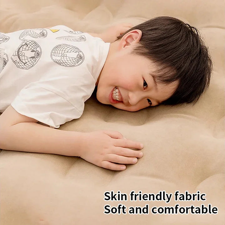 Portable double air bed, self-inflating for camping comfort & convenient guest sleeping. Easy setup.