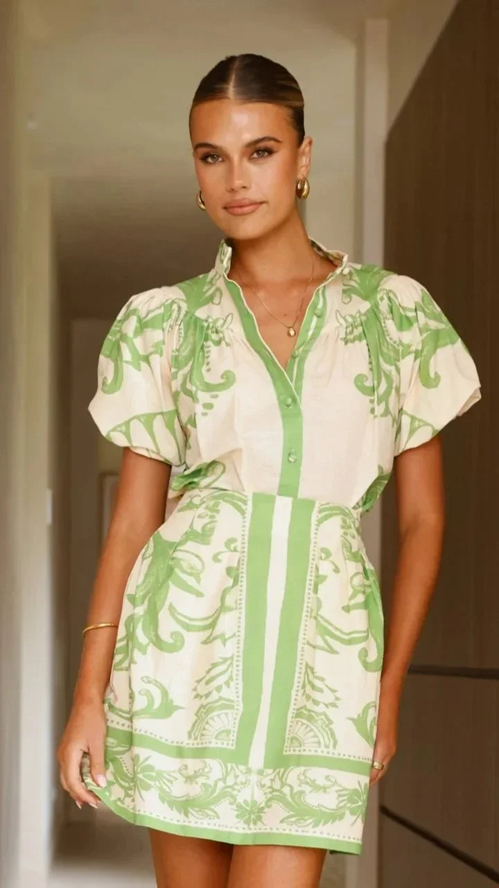 Stylish women's puff sleeve floral mini dress, a versatile piece for spring/summer.