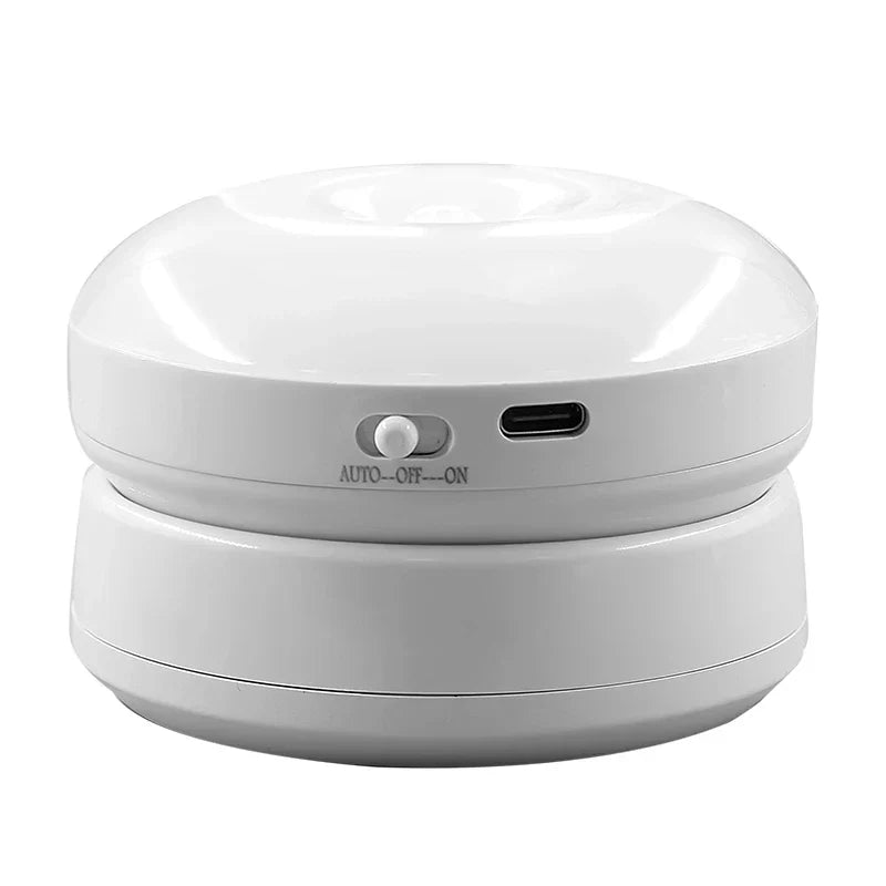 Magnetic LED motion sensor night light, USB rechargeable for cabinets. Wireless & energy-saving home lighting.