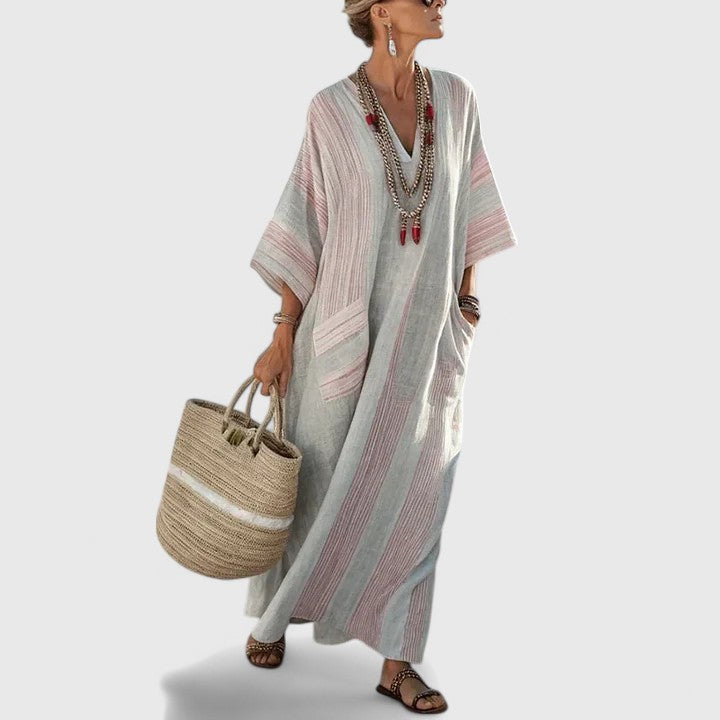 Elegant women's bohemian maxi dress with convenient pockets. Perfect long summer dress for vacation & casual style.